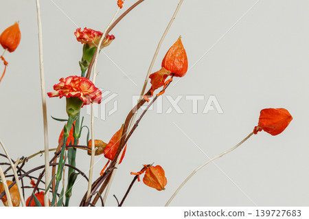 Christmas composition of fresh flowers Christmas composition of fresh flowers 139727683
