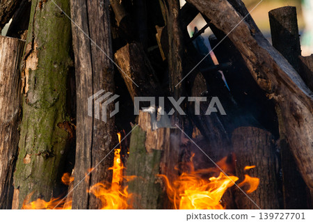 Beautiful fire flames on a campfire Beautiful fire flames on a campfire 139727701