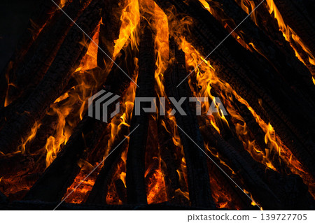 Beautiful fire flames on a campfire Beautiful fire flames on a campfire 139727705