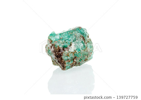 macro mineral stone emerald on a white background macro mineral stone emerald on a white background 139727759