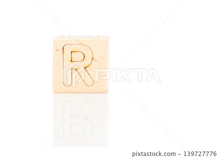 Wooden cubes with letters R on a white background Wooden cubes with letters R on a white background 139727776