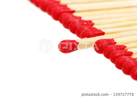 matches with a red head on a white background 139727778