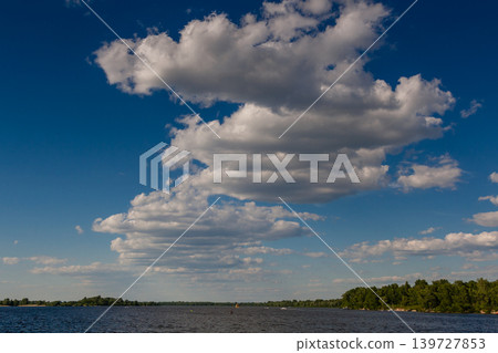 Beautiful white clouds against the blue sky Beautiful white clouds against the blue sky 139727853