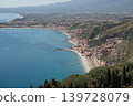 Panoramic view of Giardini-Naxos coastline in Sicily from Taormina 139728079