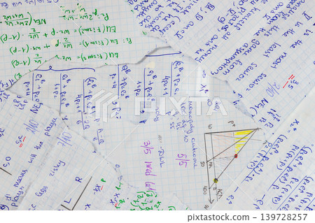Collage of torn blue graph paper scraps with handwritten mathematical formulas and notes. Abstract education background for scrapbooking, study themes, school design, creative paper texture Collage of torn blue graph paper scraps with handwritten mathematical formulas and notes. Abstract education background for scrapbooking, study themes, school design, creative paper texture 139728257