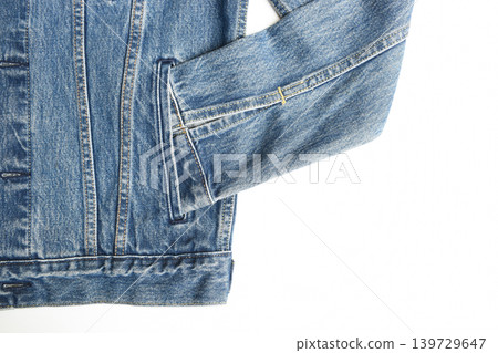 sleeve of blue denim shirt texture isolated on white background, jean fashion style sleeve of blue denim shirt texture isolated on white background, jean fashion style 139729647