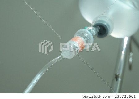 saline solution drip for patient and infusion pump in hospital, close up equipment of medicine saline solution drip for patient and infusion pump in hospital, close up equipment of medicine 139729661