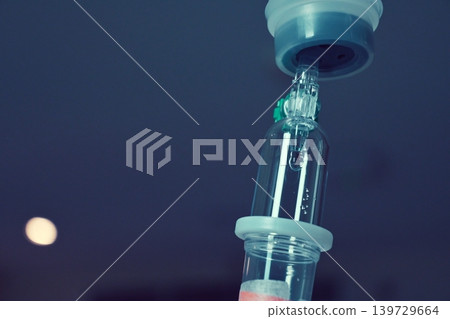 saline solution drip for patient and infusion pump in hospital, close up equipment of medicine saline solution drip for patient and infusion pump in hospital, close up equipment of medicine 139729664
