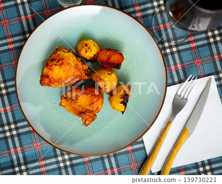 chicken with baked potatoes chicken with baked potatoes 139730221