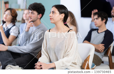 Students sit attentively in the classroom and listen to lectures Students sit attentively in the classroom and listen to lectures 139730465