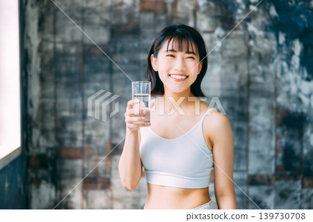 Young woman drinking water Hydration Young woman drinking water Hydration 139730708