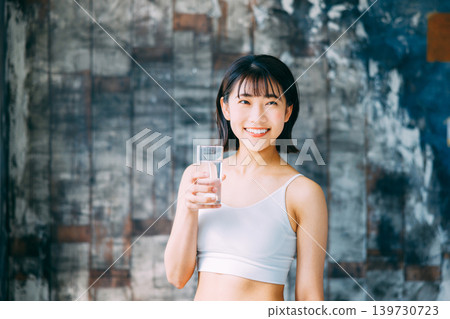 Young woman drinking water Hydration Young woman drinking water Hydration 139730723