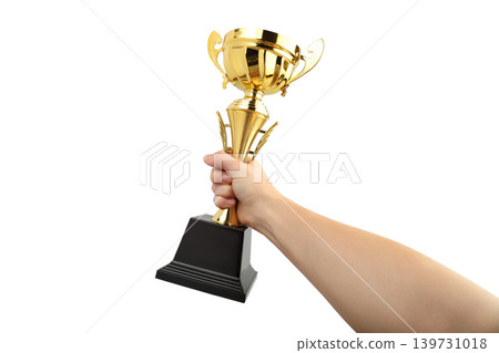 Gold trophy held firmly in a hand showcasing victory, PNG Gold trophy held firmly in a hand showcasing victory, PNG 139731018