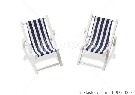 Two small beach chairs sit on the sand by the ocean, PNG Two small beach chairs sit on the sand by the ocean, PNG 139731060