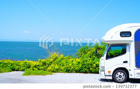 A camper van on a summer day visiting a resort A camper van on a summer day visiting a resort 139732377