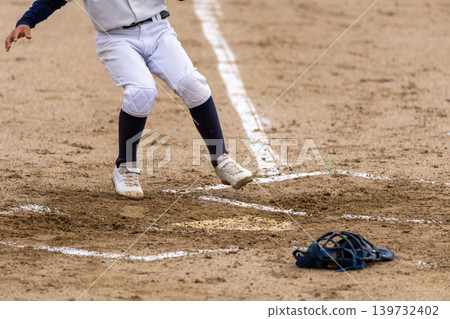 A young baseball player who is working hard to become a professional baseball player A young baseball player who is working hard to become a professional baseball player 139732402