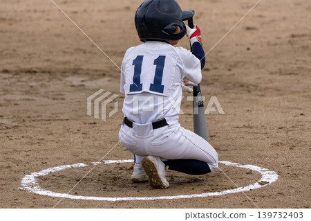 A young baseball player who is working hard to become a professional baseball player A young baseball player who is working hard to become a professional baseball player 139732403