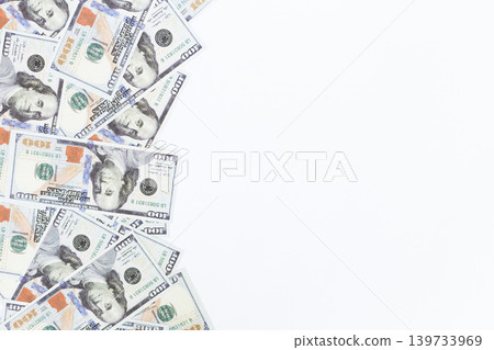 Isolated Scattered Hundred Dollar Bills Across White Background, Money Concept, Wealth, and Financial Abundance Isolated Scattered Hundred Dollar Bills Across White Background, Money Concept, Wealth, and Financial Abundance 139733969