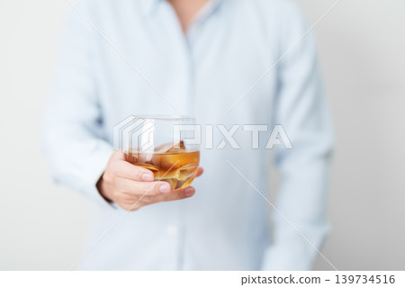 man with glass of cognac, suffering from alcohol addiction and alcoholism concept. depicting emotional distress, depression, substance abuse problem, unhealthy lifestyle and mental health man with glass of cognac, suffering from alcohol addiction and alcoholism concept. depicting emotional distress, depression, substance abuse problem, unhealthy lifestyle and mental health 139734516