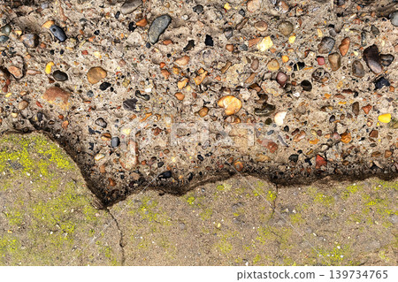 Asphalt And Moss Border With Rough Texture 139734765