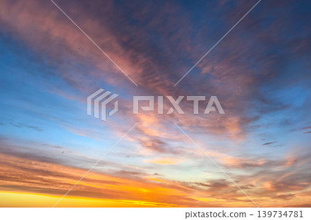 Colorful Sunset Clouds Across Evening Sky Horizon Colorful Sunset Clouds Across Evening Sky Horizon 139734781