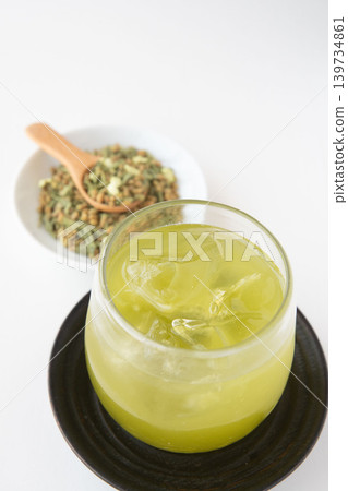 Cold matcha-infused brown rice tea Cold matcha-infused brown rice tea 139734861