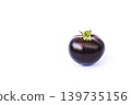 A single ripe purple Indigo Rose heirloom tomato isolated on  white background. 139735156