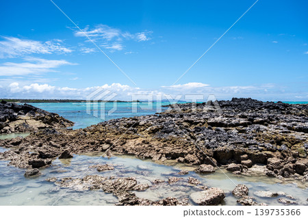 Clear turquoise waters and rocky shore at Santa Cruz Island, Galapagos, Ecuador 139735366