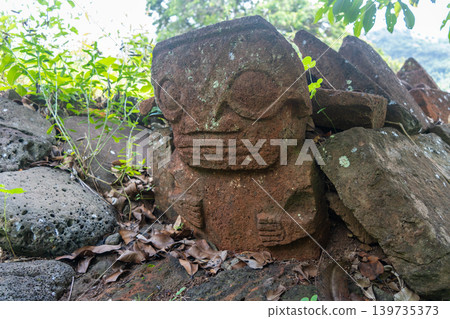 Tiki statue in the old cemetery of Atuona, Hiva Oa, French Polynesia Tiki statue in the old cemetery of Atuona, Hiva Oa, French Polynesia 139735373