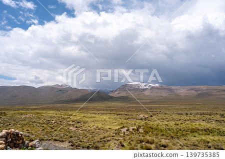 Vast valley and mountains landscape with dramatic sky, Peru Vast valley and mountains landscape with dramatic sky, Peru 139735385
