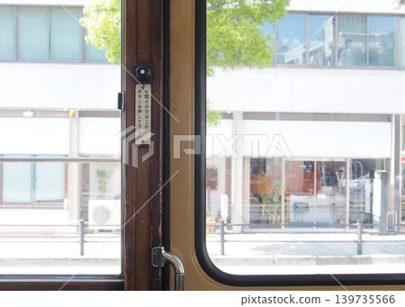 Retro-style stop request button (Matsuyama City Tram) 139735566