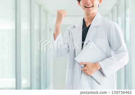 Male staff members in the hospital corridors: doctors, physicians, medical professionals, pharmacists, scientists, researchers 139736462