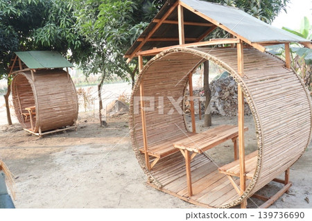 round bamboo gazebo with seat on restaurant 139736690