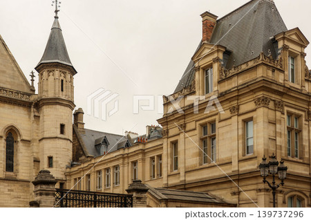 Palais de justice architecture in Paris, France, showing historic building details and classic stonework Palais de justice architecture in Paris, France, showing historic building details and classic stonework 139737296