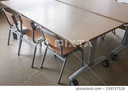 School Desks And Chairs In Empty Classroom School Desks And Chairs In Empty Classroom 139737526
