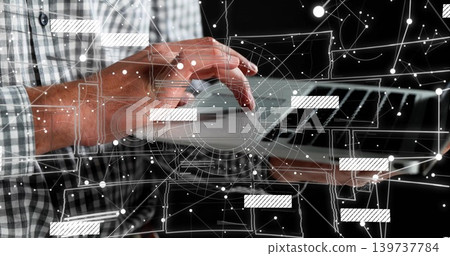 Typing hands in checkered shirt using laptop trackpad at desk, showing AR overlay Typing hands in checkered shirt using laptop trackpad at desk, showing AR overlay 139737784