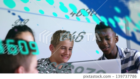 Working group of four leaning over laptop at classroom table, with AR overlays and striped shirts Working group of four leaning over laptop at classroom table, with AR overlays and striped shirts 139737786