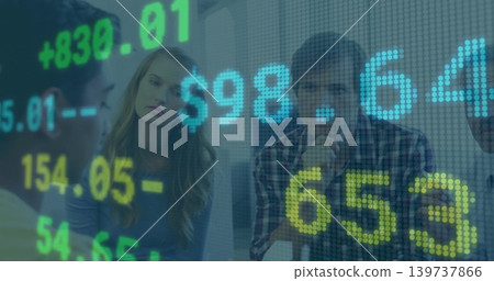 Group of analysts viewing projected ticker and discussing stock data in boardroom, business casual Group of analysts viewing projected ticker and discussing stock data in boardroom, business casual 139737866