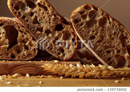 Fresh backed ciabatta bread on a wooden cutting board. Fresh backed ciabatta bread on a wooden cutting board. 139738092