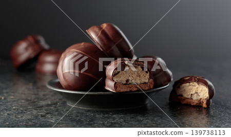 Chocolate-covered coffee souffle cookies. Chocolate-covered coffee souffle cookies. 139738113