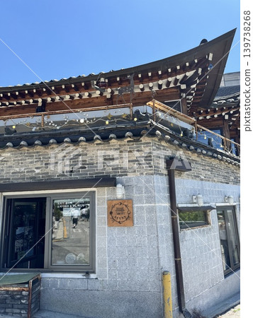 Enjoy the traditional streetscape at Bukchon Hanok Village, a popular tourist spot in Seoul, South Korea. Enjoy the traditional streetscape at Bukchon Hanok Village, a popular tourist spot in Seoul, South Korea. 139738268