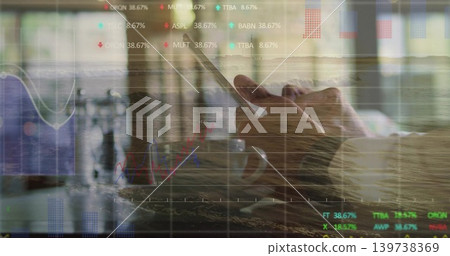 Tapping man wearing shirt holding smartphone at cafe, with coffee mug and stock charts Tapping man wearing shirt holding smartphone at cafe, with coffee mug and stock charts 139738369