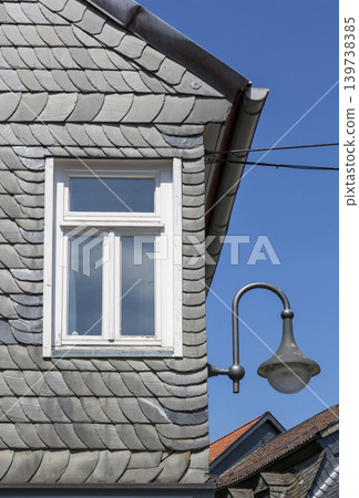 Detail of a house made of natural slate tiles in Goslar in Germany 139738385