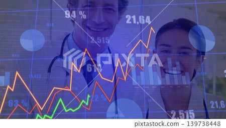 Analyzing two doctors in white lab coats viewing dashboard at clinic with stethoscopes and graphs 139738448