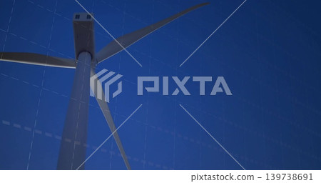 Filling frame wind turbine tower rising at wind farm, showing nacelle, three blades, blade mounts 139738691