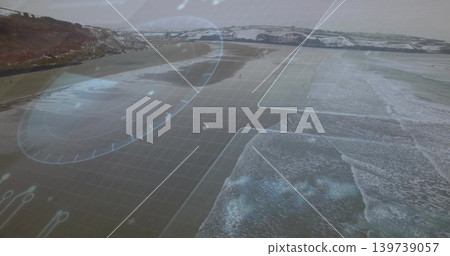 Showing coastal shoreline with HUD overlay from aerial low-tide view, wet flats, waves, headland 139739057