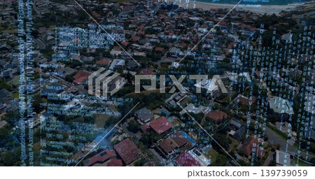 Showing high-altitude coastal neighborhood, displaying detached houses, parked cars, code overlay 139739059