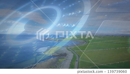 Surveying aerial coast tracing curving road and rocky shoreline by fenced fields with vehicle, HUD Surveying aerial coast tracing curving road and rocky shoreline by fenced fields with vehicle, HUD 139739060