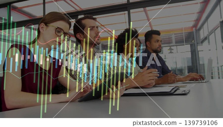 Reviewing charts, team discussing data in meeting room with laptop and tablet, in business attire Reviewing charts, team discussing data in meeting room with laptop and tablet, in business attire 139739106