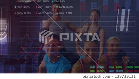 Posing five people wearing athletic tops holding dumbbell and smiling to camera at gym, with charts Posing five people wearing athletic tops holding dumbbell and smiling to camera at gym, with charts 139739131